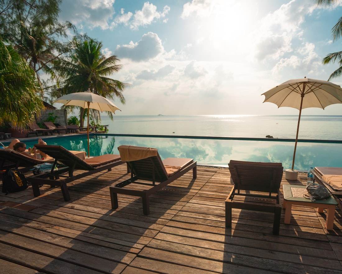 Villa pool deck at golden hour (representative)